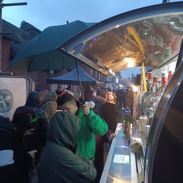 Java John's serving guests at an indoor event
